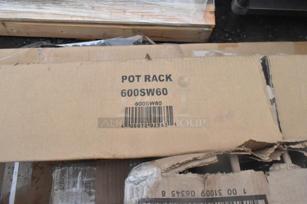 Cardboard box labeled "Pot Rack 600SW60" with visible barcode and worn edges.