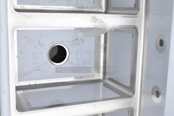 BRAND NEW SCRATCH AND DENT! Regency 600S31220 45" stainless steel sink with three 12"x20"x12" bowls, no legs.