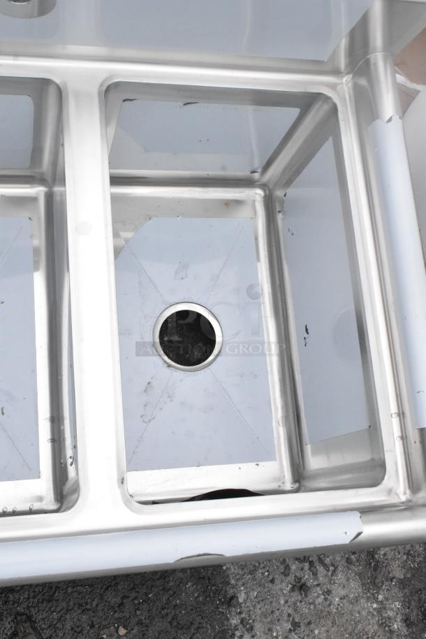 Brand new Regency 600S31220 45" three-compartment stainless steel sink, 16-gauge, scratch and dent, 12"x20"x12" bowls.