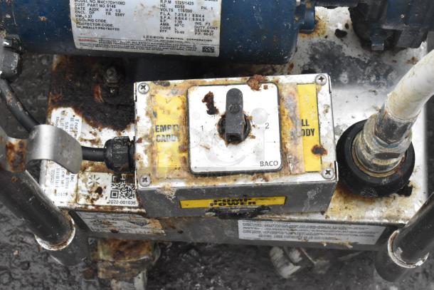 Frontline 10SS stainless steel commercial oil filtration system with visible rust and wear, model and pump details shown.