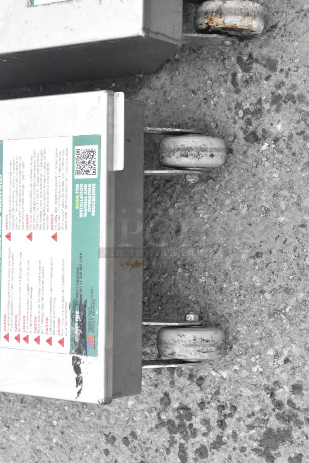 Frontline 10SS Stainless Steel Oil Filtration System on casters, visible condition marks, detailed safety instructions label.