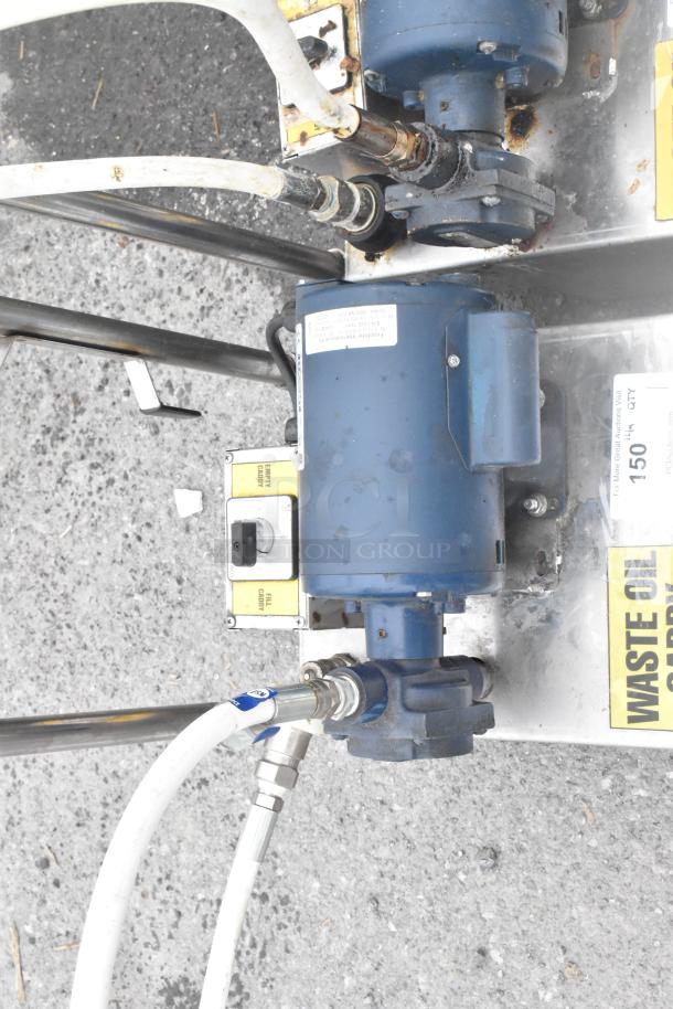 Frontline 10SS stainless steel oil filtration system on casters, featuring blue motor, white hoses, and industrial control panel.