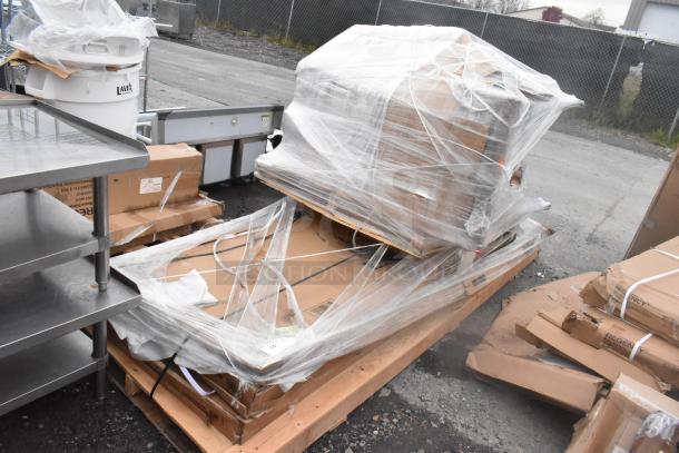 Five new scratch and dent items wrapped in plastic on pallets, includes Regency shopping cart and Lancaster table top.