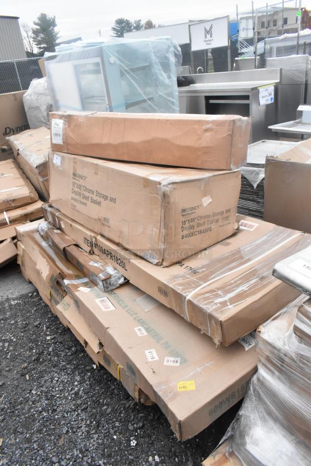 Stack of boxed items including Regency chrome shelves, new condition with visible dent marks. Tags indicate model and size.