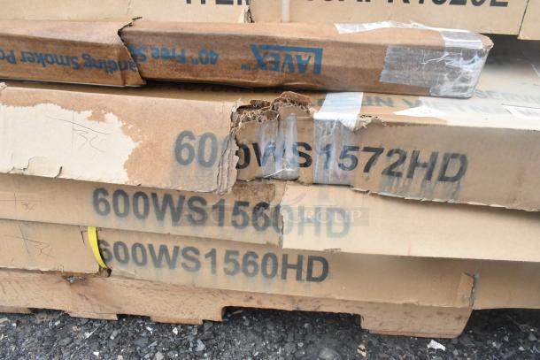 Stack of labeled boxes marked "600WS1560HD" with visible dents and tears. Contains various items.