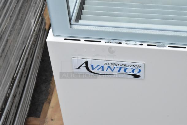 Brand new Avantco 193BCF48W refrigerated bakery display case in white with glass damage, 110-120V, 1 Phase.