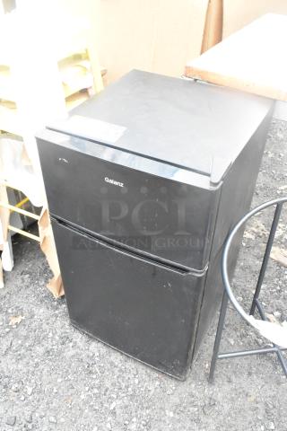 Galanz GL31BK Mini Cooler w/ Freezer, 115V, 1 Phase, black finish, visible wear, suitable for compact spaces.