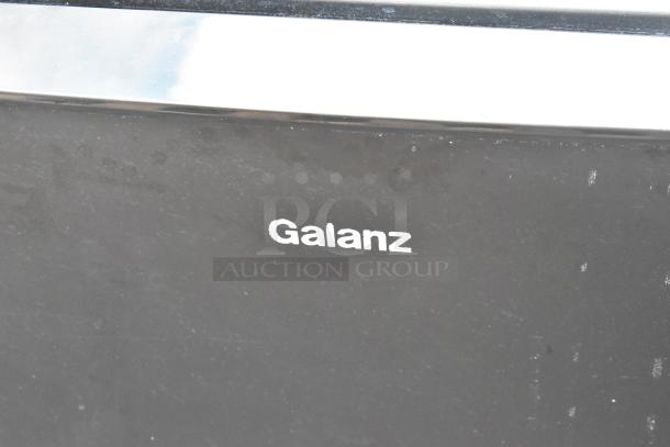 Galanz GL31BK Mini Cooler with Freezer, black exterior, visible logo, 115 volts, 1 phase. 