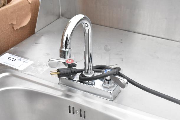 QualServ stainless steel portable sink with single bay, commercial casters, and chrome faucet. Includes plug; minimal wear visible.