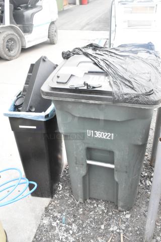 Two poly trash cans with contents. One green can marked "U1360221," includes a lid. Items show signs of outdoor use.