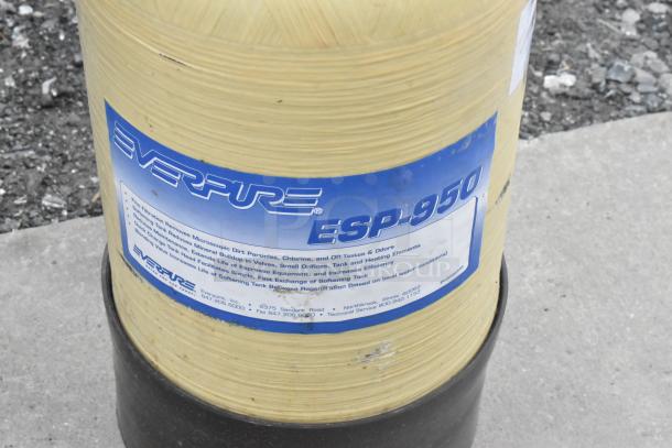 Everpure ESP-950 Tank, cylindrical, beige color, blue label with specifications visible, in used condition.
