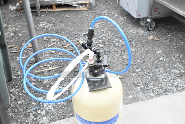 Everpure ESP-950 Tank, featuring blue and white tubing, in good condition. Essential for water filtration systems.
