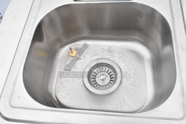 QualServ stainless steel single bay portable sink with commercial casters, high-quality and durable construction.