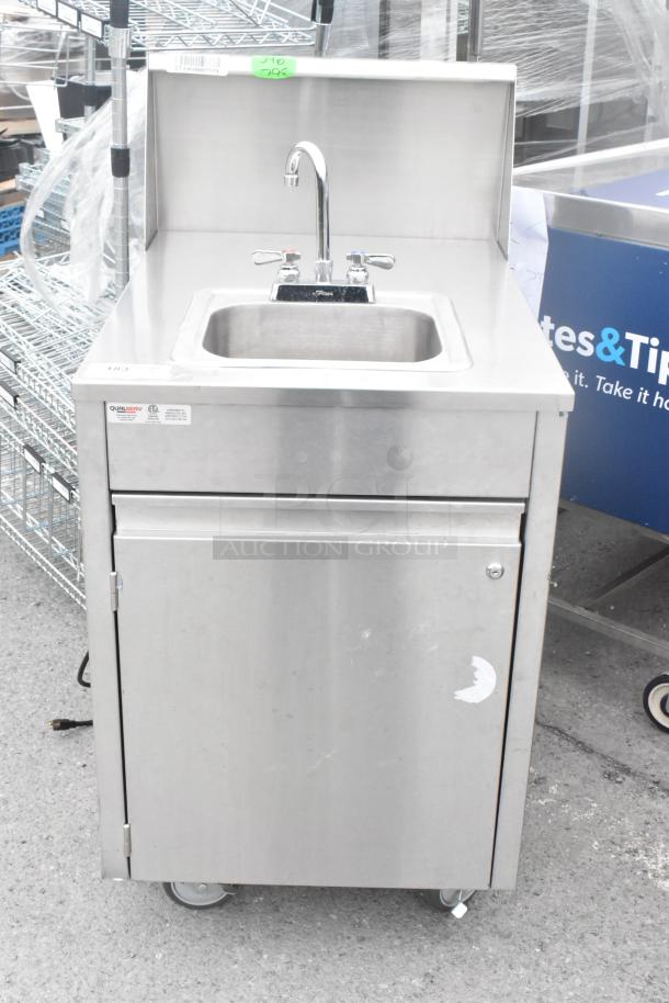 QualServ stainless steel single bay portable sink on commercial casters, faucet included, excellent condition.