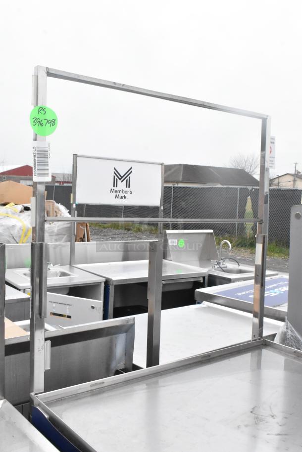 Stainless steel table with under shelf on commercial casters, Member's Mark logo, good condition, green tag RS396798.