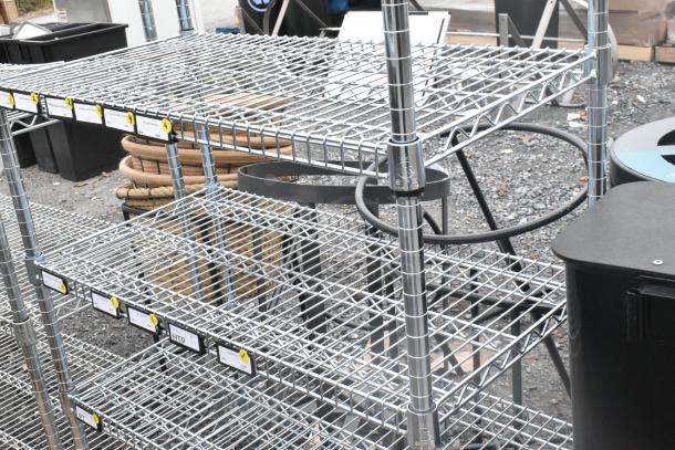 Chrome finish 7-tier wire shelving unit, sturdy design, labels visible, dismantling required for buyer, freight charges apply.