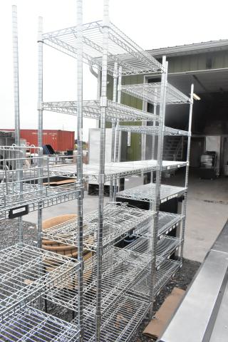 Chrome finish 6-tier wire shelving unit, sturdy and spacious. Buyer must dismantle; consider freight charges.