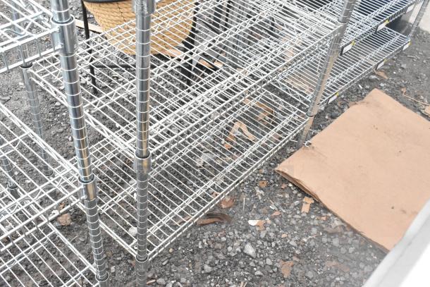 Chrome finish 6-tier wire shelving unit, sturdy design, requires dismantling. Consider freight charges for shipping.