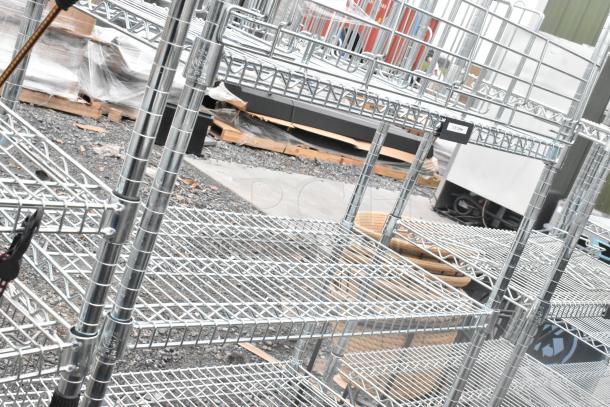 Chrome finish 4-tier wire shelving unit, sturdy construction, slight outdoor wear. Buyer must dismantle.