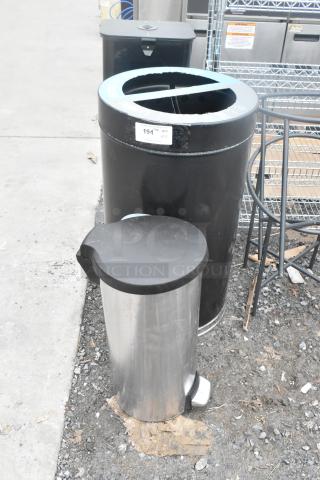 Three assorted trash cans, including a stainless steel pedal bin and two black bins. Label reads "194, QTY 3."