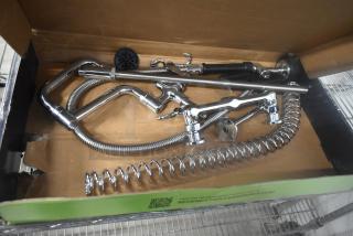 Regency 600PRW8X 1.15 GPM wall-mounted pre-rinse faucet with 8" centers, 44" hose, chrome finish, new in open box.