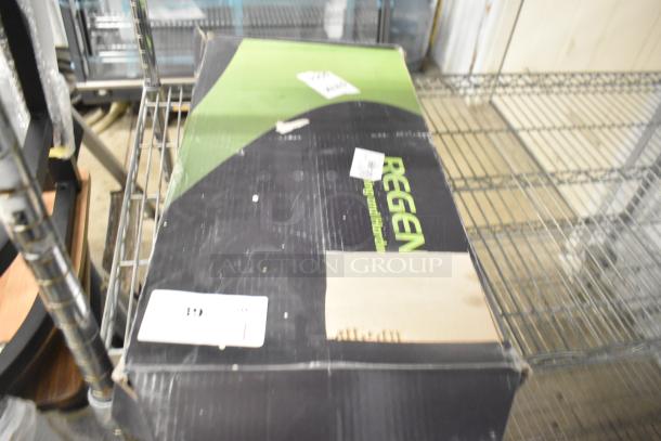 Regency 600PRW8X pre-rinse faucet box showing brand label. New, sealed; features include 1.15 GPM, 8" centers, 44" hose.