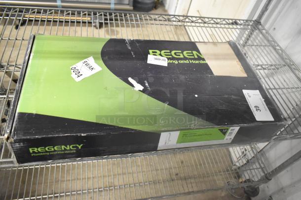 Regency 600PRW8X pre-rinse faucet in original box, features 1.15 GPM flow, 8" centers, 44" hose. Box shows slight wear.
