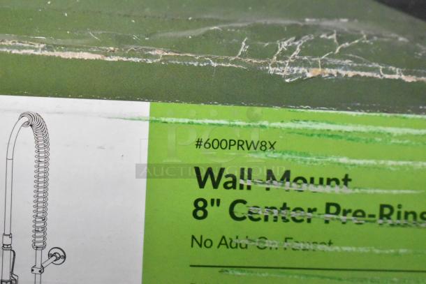 Regency 600PRW8X wall-mounted pre-rinse faucet, 8" centers, 44" hose, 1.15 GPM; package shows wear.