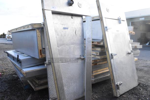 Two Penn walk-in boxes forming a combo box, no compressors or fans included. Metal finish, outdoor stack. Some rust visible.