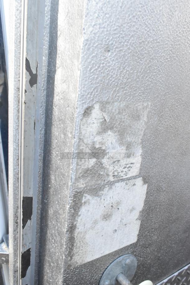 Two Penn walk-in boxes forming one combo unit, no compressors, condensers, or evaporator fans. Worn exterior with visible scratches.