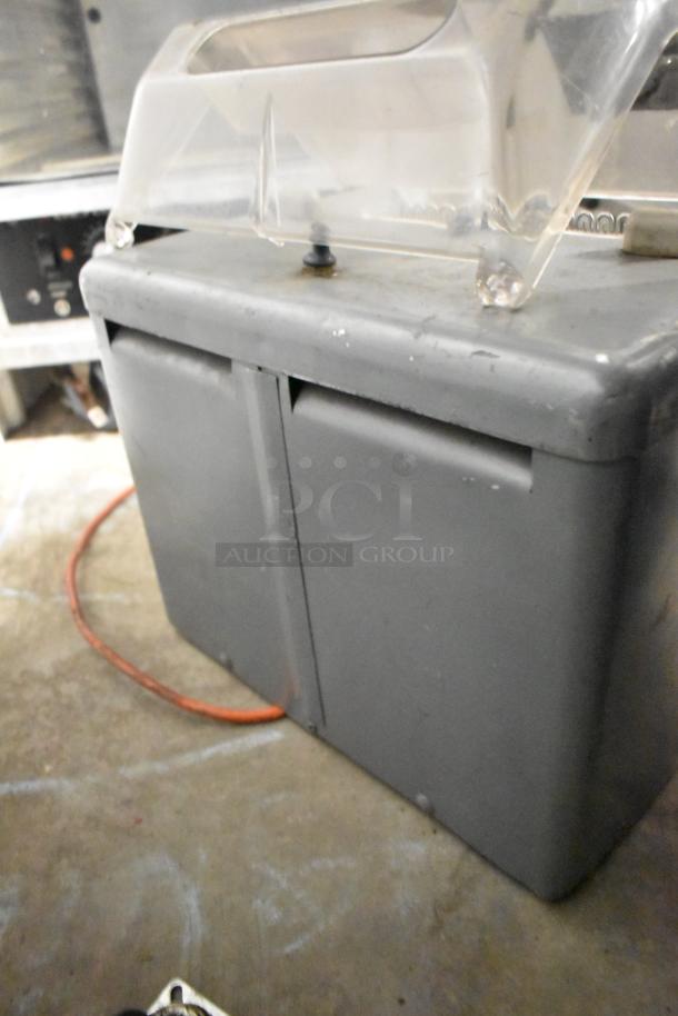 Metal Commercial Countertop Electric Meat Tenderizer, 115V, 1 Phase, clear plastic cover, visible power cable, used condition.