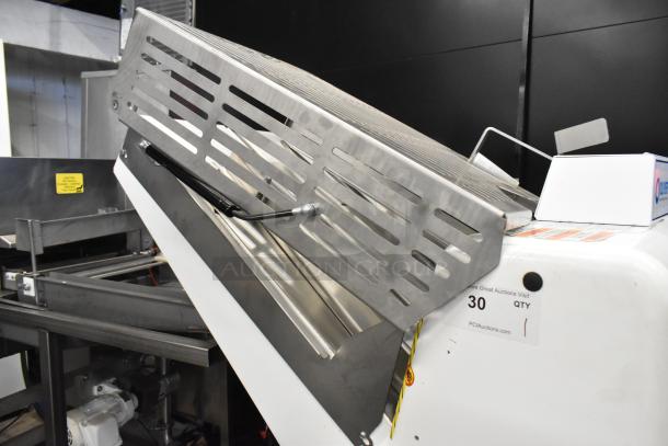 Oliver 797-32NC metal bread loaf slicer, commercial floor style, 115 volts, 1 phase, excellent condition, visible auction tags.