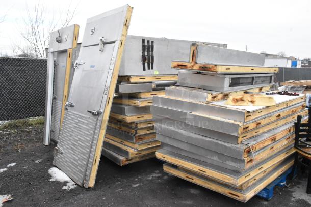 Two Penn walk-in box panels stacked, without compressors, condensers, or evaporator fans. Weathered condition.