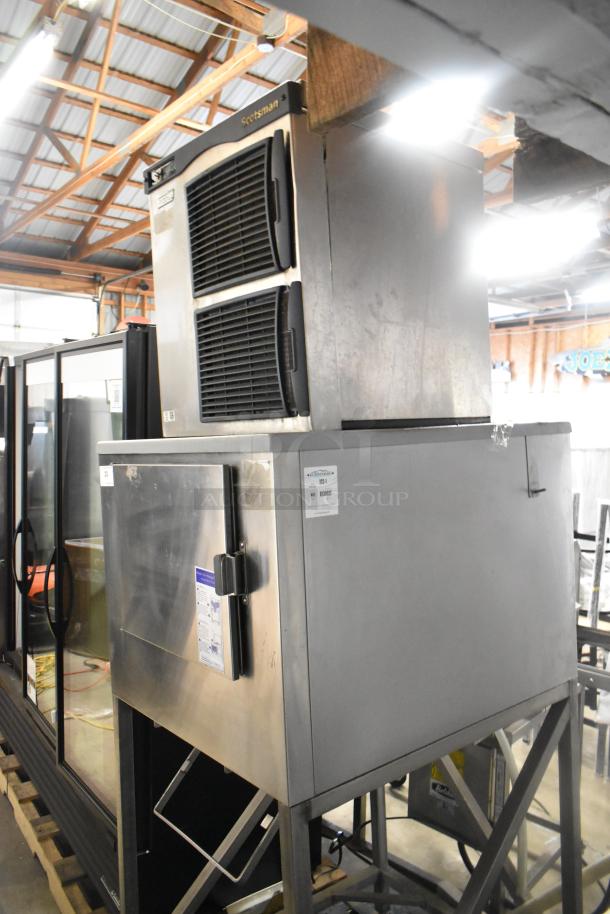 Scotsman Prodigy ice head on Kloppenberg ICS-1 stainless steel ice bin. Industrial setup, used condition, visible labels.