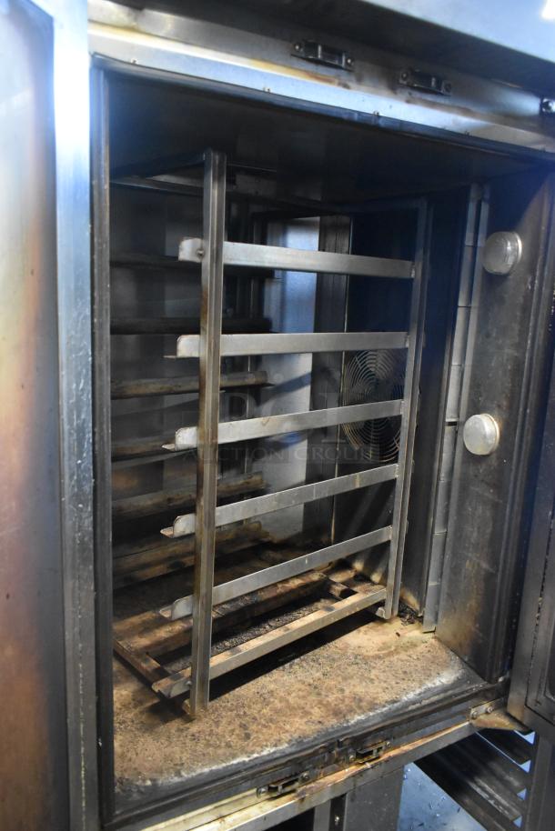 Baxter OV310G stainless steel commercial gas rotating rack oven with double pan rack and casters. Right door non-functional.