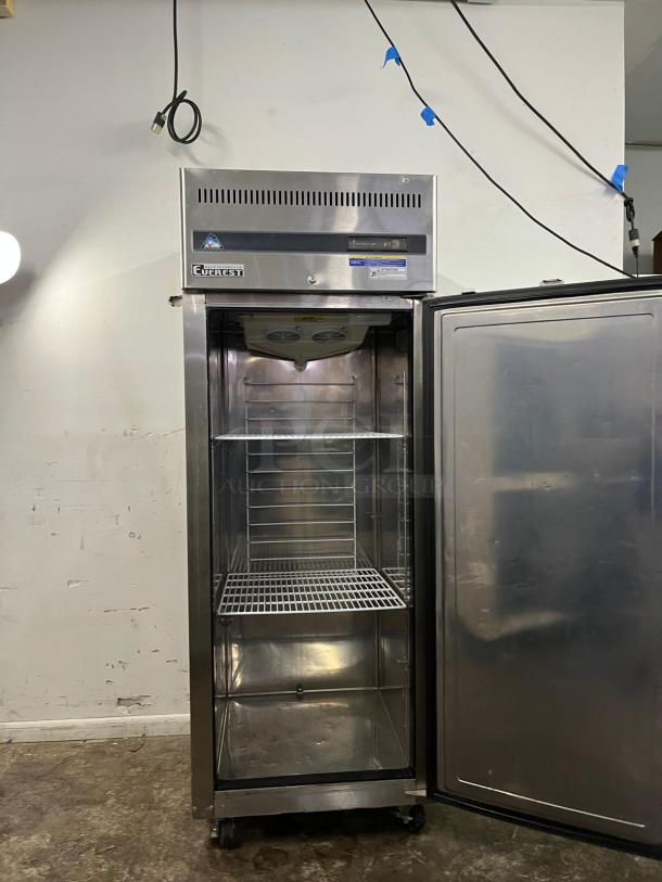 EVEREST ESF1 commercial-grade reach-in freezer, stainless steel, single-section, shelves visible, on casters, open door.