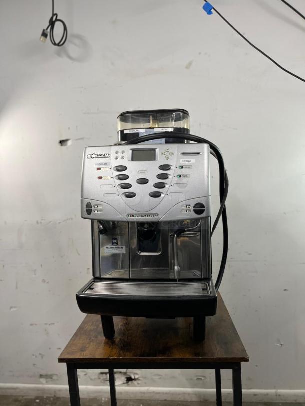 La Cimbali M2 BARSYSTEM espresso machine, robust and fully automatic, stainless steel finish, suitable for commercial use.