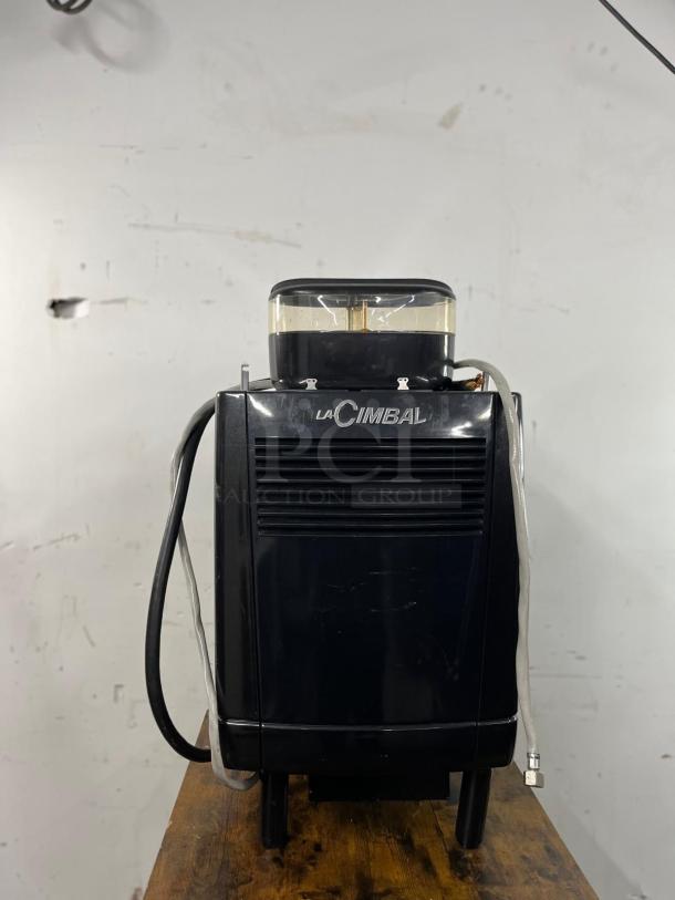 La Cimbali M2 Barsystem commercial espresso machine, black, visible tubing, in good condition, robust design.