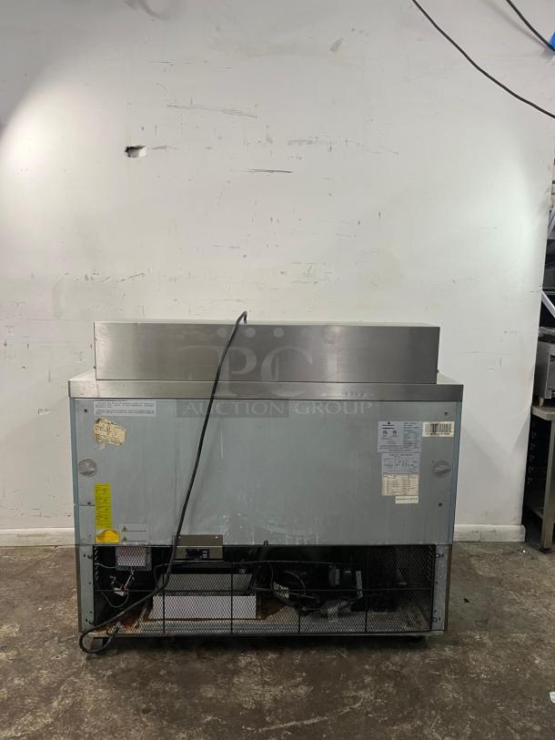 Kelvinator KCHMT48.18 48" prep table, refrigerated base, visible wear, factory labels, 115v.