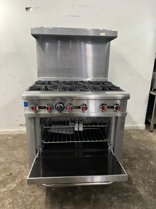 BRAND NEW Omcan 43151 36" gas range with 6 open burners, 211,000 BTU. Stainless steel, commercial-grade, open oven door.