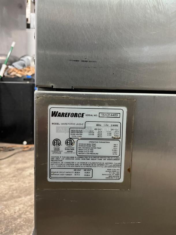 WAREFORCE UH30-E commercial dishwasher with energy-efficient, high-temp design. Model and serial number plate visible.
