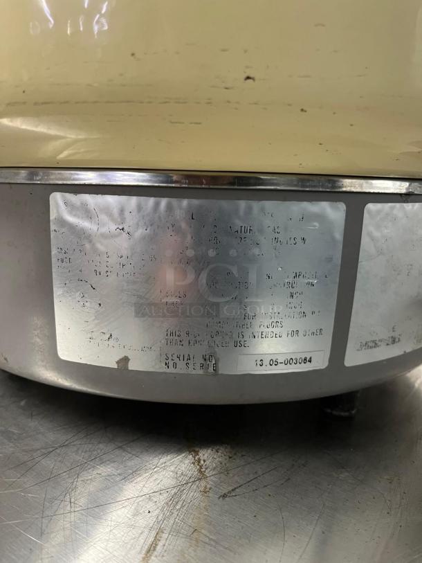 Rinnai RER55ASN 55 Cup Commercial Natural Gas Rice Cooker with visible serial number, showing signs of use.