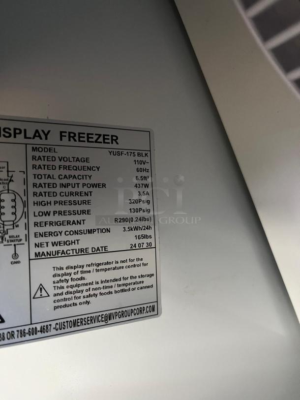 YUKON USF-175BLK commercial freezer tag showing model, voltage 110V, capacity 6.5ft³, refrigerant R290, and other specs.