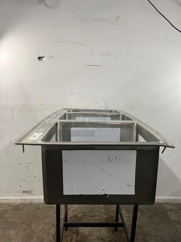 BRAND NEW Regency 16-Gauge Stainless Steel three compartment drop-in sink, model 600DI31612, pristine condition.