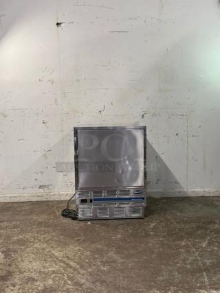 Follett REV 4-ADA under counter refrigerator, stainless steel, right hinge, visible dents, good condition, model labeled.