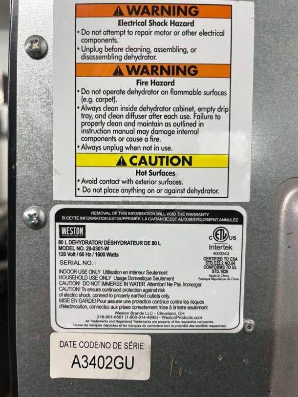 BRAND NEW Weston Pro-1200 12-tray Digital Dehydrator with 80L capacity, model 28-0301-W, 1600W, warnings visible.