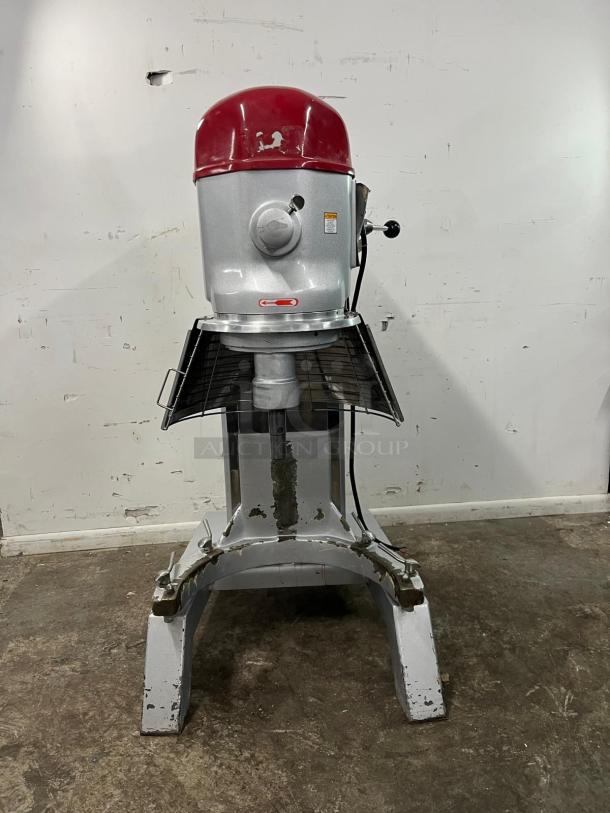 AXIS AX-M80 planetary mixer with red and silver body, visible wear, model AX-M8027. Ideal for commercial kitchens.