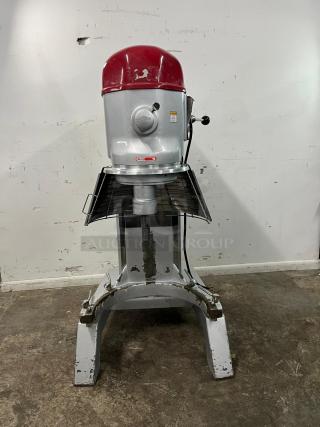 AXIS AX-M80 planetary mixer with red and silver body, visible wear, model AX-M8027. Ideal for commercial kitchens.