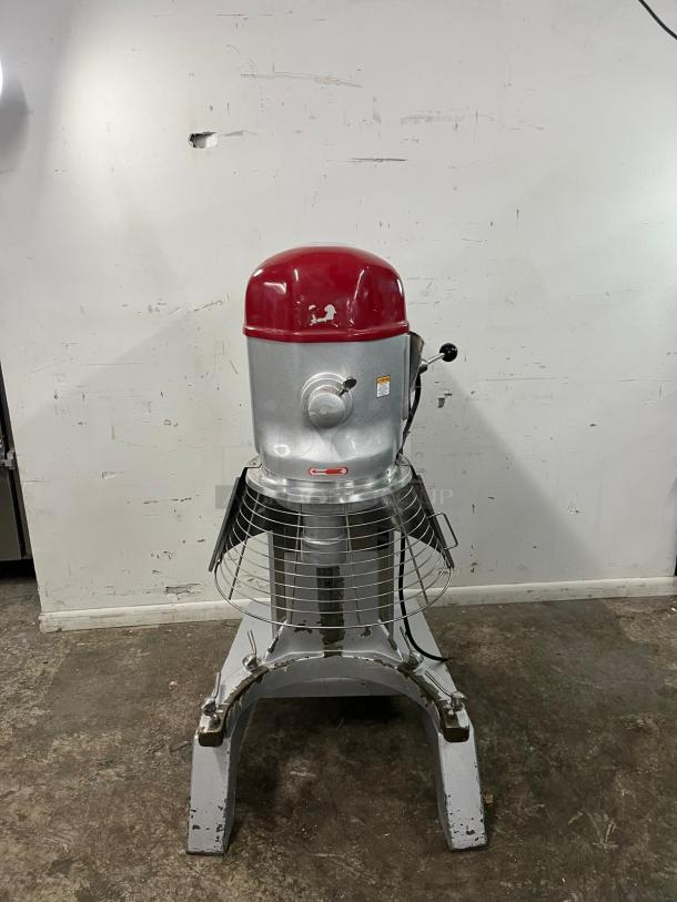 AXIS AX-M80 planetary mixer, model AX-M8027, silver and red, with protective grid, visible wear marks, sturdy base.