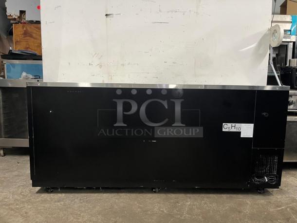 PADELA UBB-4-HC 90" 3-section solid-door back bar cooler, black exterior, in good condition, model UBB-4-HC.